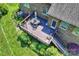 Aerial view of a spacious wooden deck with outdoor furniture, perfect for entertaining and relaxation at 7916 Deerbridge St, Mint Hill, NC 28227