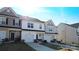 Charming townhome features a well-manicured lawn, one-car garage, and a welcoming exterior at 8177 Sheffield Dr, Terrell, NC 28682