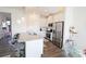 The spacious kitchen features stainless steel appliances, ample counter space, and stylish gray bar stools at 8177 Sheffield Dr, Terrell, NC 28682