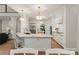Large kitchen features marble counters, stainless appliances, custom cabinets, and pendant lighting at 8433 Cheverny Dr, Waxhaw, NC 28173