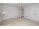 Bedroom features carpet, white walls, a ceiling fan, and a closet for ample storage at 8618 Rittenhouse Cir, Charlotte, NC 28270