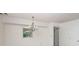 Cozy dining area with a chandelier and a window looking outside at 8618 Rittenhouse Cir, Charlotte, NC 28270