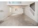 Spacious living room featuring a chandelier, stairs and an open floor plan at 8618 Rittenhouse Cir, Charlotte, NC 28270