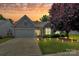 Charming single-Gathering home with a well-manicured lawn, beautiful landscaping, and inviting curb appeal at 8722 Heron Glen Dr, Charlotte, NC 28269