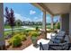 Relaxing porch with comfortable chairs offering a picturesque view of the well-maintained neighborhood street at 1006 Gradison Dr, Matthews, NC 28104
