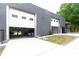 View of garage with open doors, showcasing ample space and a clean environment at 1028 Washburn Switch Rd, Shelby, NC 28150