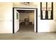 Wide doorway leading into the building with multiple posted notices at 1028 Washburn Switch Rd, Shelby, NC 28150