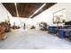 Spacious garage with vehicle lift, work benches, tools and ample storage at 1028 Washburn Switch Rd, Shelby, NC 28150