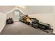 Attic featuring a carpeted floor, dormer window, and plenty of extra storage space at 1185 Willow Creek Dr, Newton, NC 28658