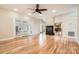 Open living area with hardwood floors, fireplace, and natural light, creating a warm and inviting atmosphere at 1185 Willow Creek Dr, Newton, NC 28658