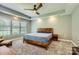 Large main bedroom featuring a ceiling fan, trey ceiling, and lots of natural light at 1185 Willow Creek Dr, Newton, NC 28658
