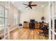 Spacious home office with hardwood floors, custom built-ins, and plenty of natural light at 1185 Willow Creek Dr, Newton, NC 28658
