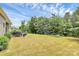 Large, well-maintained backyard with a lawn and mature trees provides ample space at 1397 Tupelo Rd, Clover, SC 29710
