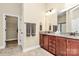Bathroom featuring tile floor, granite countertops and cherry-stained cabinets at 1397 Tupelo Rd, Clover, SC 29710