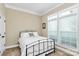 Bedroom with neutral color palette, a large window, and hardwood floors at 1397 Tupelo Rd, Clover, SC 29710
