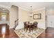 Dining room featuring hardwood floors, a large table, and wainscoting at 1397 Tupelo Rd, Clover, SC 29710