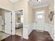 Inviting foyer with hardwood floors, decorative wainscoting, and an open view at 1397 Tupelo Rd, Clover, SC 29710