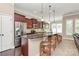 Modern kitchen with stainless steel appliances, granite countertops, and a breakfast bar at 1397 Tupelo Rd, Clover, SC 29710