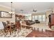 Open-concept living space with dining area, a modern kitchen, and a cozy living room at 1397 Tupelo Rd, Clover, SC 29710
