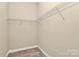 Walk-in closet with carpet, wire shelving and neutral walls at 1397 Tupelo Rd, Clover, SC 29710