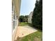 A spacious backyard with a concrete patio and views of neighboring houses at 1423 Napa Nw St, Concord, NC 28027