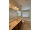 Bright bathroom featuring double sink vanity and a soaking tub at 1423 Napa Nw St, Concord, NC 28027