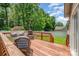 Inviting back deck with wooded views features comfortable seating and a cozy outdoor space at 146 Pheasant Ridge Cir, York, SC 29745