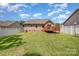 View of the backyard showing the deck and privacy fence surrounding the property at 146 Pheasant Ridge Cir, York, SC 29745