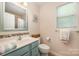 Bright bathroom features a mirror, decorative tile, and a window for natural light at 146 Pheasant Ridge Cir, York, SC 29745