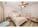 Cozy bedroom showcases a stylish ceiling fan, light pink walls, and coordinating furniture at 146 Pheasant Ridge Cir, York, SC 29745