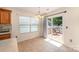 Inviting breakfast nook featuring a sliding glass door to a wooden deck and ample natural light at 146 Pheasant Ridge Cir, York, SC 29745