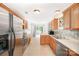 Well-equipped kitchen featuring stainless steel appliances, tiled backsplash, and plenty of counter space at 146 Pheasant Ridge Cir, York, SC 29745
