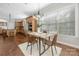 Bright dining area adjacent to a kitchen and with a large window view at 15024 Old Vermillion Dr, Huntersville, NC 28078