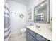 Simple bathroom featuring a vanity, modern fixtures, a toilet and a shower with a decorative shower curtain at 155 Culpeze Rd, Mooresville, NC 28117
