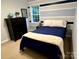 Pleasant bedroom featuring an accent wall, hardwood floors, natural light and bedside tables at 155 Culpeze Rd, Mooresville, NC 28117