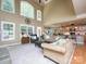 Comfortable living room with an open floor plan, large windows and neutral decor at 155 Culpeze Rd, Mooresville, NC 28117