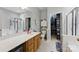 This bathroom features a large mirror, walk in closet, and glass shower door at 158 Snead Rd, Fort Mill, SC 29715