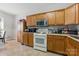 Functional kitchen equipped with wooden cabinetry, modern appliances, and ample counter space for cooking at 158 Snead Rd, Fort Mill, SC 29715
