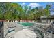 Community pool area with numerous lounge chairs and a bath house, perfect for relaxation at 158 Snead Rd, Fort Mill, SC 29715