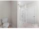 Clean bathroom with walk-in shower featuring a clear glass door at 1651 Carolina Cir, Gastonia, NC 28054