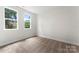 Bedroom featuring natural light and neutral carpeting throughout at 1651 Carolina Cir, Gastonia, NC 28054