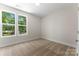 Cozy bedroom with natural light and neutral carpeting creating a peaceful atmosphere at 1651 Carolina Cir, Gastonia, NC 28054