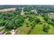 Aerial shot showcases a secluded home nestled among trees and greenery, providing a sense of privacy at 1783 Radio Station Rd, Newton, NC 28658