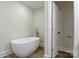 Spa-like bathroom with a freestanding tub and modern fixtures at 1783 Radio Station Rd, Newton, NC 28658