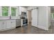 Well-lit kitchen showcases stainless steel appliances and ample cabinet space at 1783 Radio Station Rd, Newton, NC 28658