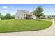 Charming two-story home boasts a manicured lawn and stone accents at 196 Sutters Mill Dr, Troutman, NC 28166