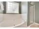 Relax in this beautiful tub located in the main bathroom at 2132 Cubla Ct, Rock Hill, SC 29732