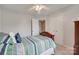 Bright bedroom with hardwood floors, large window, and a spacious closet at 2132 Cubla Ct, Rock Hill, SC 29732