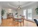 Charming dining room with hardwood floors, french doors, and elegant lighting for Gathering gatherings at 2132 Cubla Ct, Rock Hill, SC 29732