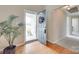 Bright foyer with hardwood floors, an open door, and natural light, creating a welcoming entry at 2132 Cubla Ct, Rock Hill, SC 29732